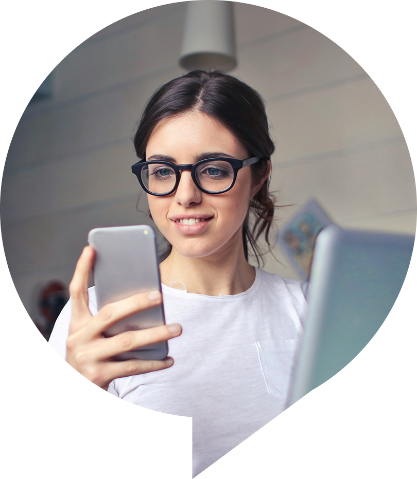 EBCentral Built for Whats Next 2 Woman smiling while using her smartphone next to the text ‘Built for What’s Next,’ representing how the EBCentral platform supports future-ready benefits management.