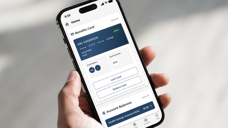 EBCentral Dashboard Person holding a smartphone displaying the EBCentral dashboard, showing the benefits card details, card controls, and account balances.