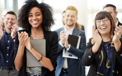 Employees engaging in a modern workplace, representing personalized and evolving employee benefits experiences