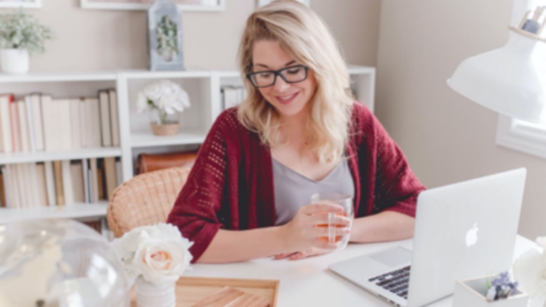 Relaxed professional using technology to manage Premium Only Plans, demonstrating secure digital tools for employee benefits.